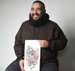 Image of a man holding a drawing